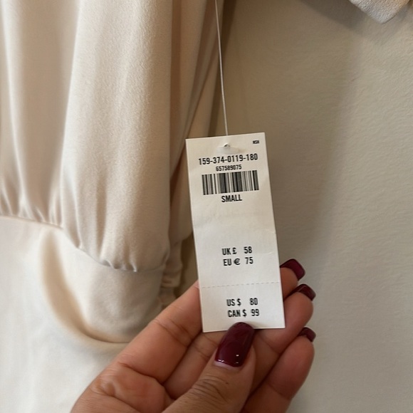 Abercrombie & Fitch Ruched Knit Short Sleeve Mini Dress in Cream - Picture 8 of 10